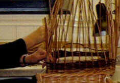 Student working on a basket