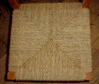 Rush-pattern seat worked in seagrass